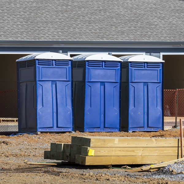 how often are the portable restrooms cleaned and serviced during a rental period in Helm California